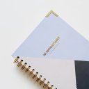 Cover of The Happiness Planner (June-July)